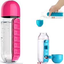 Clear 2-in-1 water bottle with built-in pill dispenser compartment, ideal for travel, fitness, or daily medication use, shown on a kitchen counter.